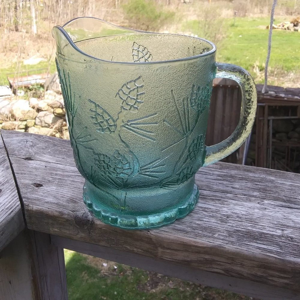 Tiara glass pitcher green with textured  pine cone images